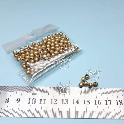 مهره پلاستیکی طلائی متالیک سایز 5میل (10 گرمی)